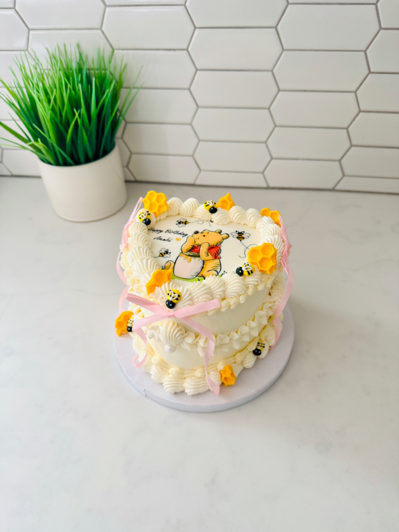 Winnie the Pooh themed heart cake